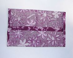 a piece of fabric with flowers and butterflies on it