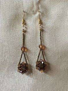 These flower drops are a fun addition to any outfit.  Dress them up or dress them down- they'll accommodate you. Beaded Earrings Diy, Outfit Dress, Drop Beads, Crystal Flower, Diy Earrings, Beaded Earrings, Jewelry Earrings Dangle, Arrow Necklace, Etsy Earrings