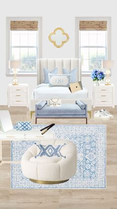 a bedroom with white furniture and blue accents