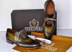 Buy TucciPolo Mens Handmade Wingtip Oxford Style Brogues Green Luxury Shoe with leather wrapped laces. A special model characterized by two-colour for an elegant style . Finished with leather sole. Shop now Green hand-painted leather upper Bordeaux burnished leather sole Wingtip oxford style brogues Leather wrapped laces This is a made-to-order product. Each pair will be made upon receipt of order and shipped in approximately 15 days. Because our shoes are hand-painted and couture-level creation Green Luxury, Manly Man, Oxford Brogues, Custom Made Shoes, Italian Leather Shoes, Oxford Style, Bespoke Shoes, Luxury Belts, Wingtip Oxford