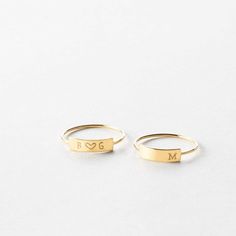 A bar ring with plenty of room to personalize with initials, a date, name or word. Minimalist Engraved Ring With Initials, Everyday Stackable Yellow Gold Rings With Initials, Simple Anniversary Rings With Initials, Simple Anniversary Ring With Initials, Classic 14k Gold Stackable Rings With Initials, Minimalist Engraved Open Ring With Initials, Classic Personalized Midi Rings For Everyday, Minimalist Stackable Initial Ring For Anniversary, Personalized Initial Ring In 14k Gold With Round Band