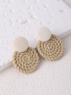 pair of earrings on white background