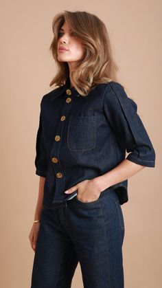 This denim shirt has a retro inspired style. It has a longer-length curved hem at the back, single breast pocket, side pleat 3/4 length sleeve and accented with feature gold buttons, for an eye catching look. Ideal for pairing effortlessly with your existing wardrobe. Or, choose the coordinating denim maxi skirt or jeans for a seamless look.   Model is 5ft 6 and wears size XS Gentle Wash City Break Outfit, Rich Girl Aesthetic, Denim Maxi, Double Denim, Denim Trends, Denim Maxi Skirt, Kendall Jenner Style, Casual Dinner Outfit, Denim Outfit