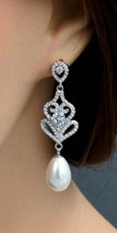 "PAIR SILVER Water-Drop Pearl Crystal Long Earrings Elegant Bridal Wedding Gauges Plugs 6g 4g 2g 4mm 5mm 6mm Length: 2\" FOR GAUGES/STRETCHED EARLOBES: All styles come with internally threaded (screw on/off) double flare tunnels. You also have the option to add an o-ring (for $1) that can be worn with the screw on/off flares for extra security that can help with possible sagging, or by themselves without the screw on/off flares making it a single flare. REGULAR POSTS/EARRINGS (not gauges for str Pierced Drop Bridal Earrings For Wedding, White Teardrop Pierced Bridal Earrings, White Teardrop Bridal Earrings Pierced, White Pear-shaped Chandelier Earrings For Gift, Silver Pierced Pearl Earrings For Wedding, White Pierced Chandelier Earrings For Anniversary, Wedding Gauges, Gauges Jewelry, Jewelry Formal