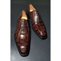 Elevate your shoe game with these bespoke leather handmade shoes. Made with genuine leather, these oxfords come in Brown, and are available in all US, UK, EU, and AU sizes. The comfortable insole and standard shoe width make them perfect for any occasion. Designed with a solid pattern and lace-up closure, these handmade shoes are a vintage addition to any wardrobe. The leather outsole adds durability and longevity to these unique boots. Customize them to your liking with personalization options Brown Oxfords With Crocodile Pattern And Round Toe, Luxury Business Oxfords With Crocodile Pattern, Luxury Leather Shoes With Crocodile Pattern, Luxury Lace-up Leather Shoes With Crocodile Pattern, Luxury Crocodile Pattern Oxfords For Business, Luxury Crocodile Pattern Leather Lace-up Shoes, Luxury Crocodile Pattern Lace-up Leather Shoes, Luxury Crocodile Pattern Leather Shoes, Luxury Brown Moc Toe Oxfords