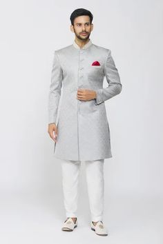 Grey sherwani featuring a geometric pattern with placement embroidery and front buttons. Paired with a matching pant made of polyester staple fiber., Fit: Relaxed Designer Straight Kurta For Ceremonial Occasions, Designer Straight Kurta For Reception, Fitted Traditional Wear With Dabka For Semi-formal Occasions, Designer Sets With Traditional Drape For Formal Occasions, Fitted Dabka Traditional Wear For Semi-formal Events, Semi-formal Fitted Traditional Wear, Designer Formal Traditional Wear With Chikankari Embroidery, Designer Traditional Wear With Chikankari Embroidery For Formal Occasions, Designer Chikankari Embroidery Traditional Wear For Formal Occasions