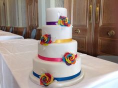 a multi - tiered wedding cake on a table