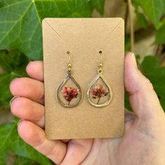 Lovely Red/Coral Flowers In Base Metal Bezel With 14k Gold Filled Ear Wires Red Pressed Flowers Earrings For Gift, Red Round Jewelry With Pressed Flowers, Red Pressed Flowers Round Jewelry, Floral Resin, Coral Flowers, Resin Earrings, Red Coral, Cute Earrings, Base Metal