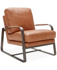 a brown leather chair sitting on top of a metal frame