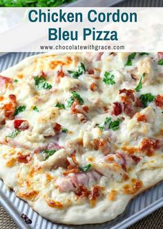 chicken cordon bleu pizza on a baking sheet