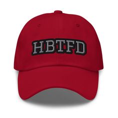 a red hat with the word hbfd embroidered on it's front side