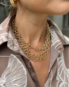 The delicate design features two layered circles, creating a unique and sophisticated aesthetic. Made of high-quality gold metal, this necklace is a timeless piece that will elevate any outfit. Lobster claw style clasp 3 Layers all connected Chain Gold Necklace, Circle Chain, Sophisticated Aesthetic, Knit Jumpsuit, Delicate Design, Chain Gold, Sweater Sale, 3 Layers, Skirts For Sale