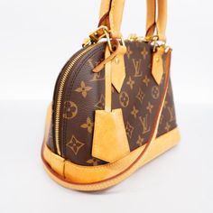 LOUIS VUITTON Alma BB HandbagBrand: Louis Vuitton Model: Alma BB Color: Brown Material: Canvas Comes with: Clochette, Dust bag, Key, Padlock, Shoulder strap Dimensions: 17.5 x 11.5 x 23.5 cm Serial number: M53152 Country of origin: France Retail price: 1550,0EUR Alma Bb, Canvas Handbags, Brown Canvas, Dust Cover, New Bag, Monogram Canvas, X 23, Dust Bag, Branding Design