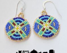 a pair of beaded earrings is shown