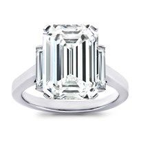 an emerald cut diamond ring with three baguets