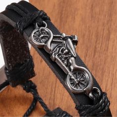 Stylist And Unique. Handmade Leather Woven Bracelet With Vintage Motorcycle Design Is Perfect For Adding A Touch Of Edgy Style To Any Outfit. With Its Adjustable Clasp This Bracelet Can Fit Most Wrists Comfortably And Securely. Length 7.09 “. 3 “ Drawstring Vintage Black Leather Bracelet For Gift, Vintage Black Leather Bracelet As Gift, Black Biker Style Bracelets For Biker Events, Adjustable Black Biker Jewelry, Prayer Jewelry, Gold Band Wedding Ring, Moto Vintage, Gold Topaz, Woven Bracelet