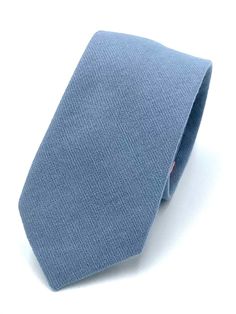 Introducing our Dusty Blue tie, a perfect blend of sophistication and charm. Crafted from 100% cotton, this tie exudes refined elegance with its textured fabric and delicate shades of dusty blue. Its serene allure makes it a timeless accessory for any occasion, whether it's a casual get-together or a formal event. We take pride in offering you the best quality skinny ties at an affordable price. Each Dusty Blue tie is individually handmade from imported fabrics, ensuring a premium feel and durab Dusty Blue Tie, Cornflower Blue Wedding, Four In Hand Knot, Floral Ties, Beachy Wedding, Wedding Aesthetics, Dusty Blue Wedding, Wedding Tie, Dusty Blue Weddings