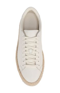 Espadrille-inspired braided jute trim brings warm-weather appeal to this sleek low-profile sneaker crafted of finely grained leather. Lace-up style Leather upper and lining/rubber sole Imported Leather Low-top Sneakers With Woven Sole, Low-top Sneakers With Woven Sole, Summer Leather Sneakers With Rubber Sole, Leather Sneakers With Rubber Sole For Summer, Spring Sneakers With Textured Sole, Leather Sneakers With Woven Sole For Spring, Summer Low-top Sneakers With Stitched Sole, Summer Leather Sneakers With Woven Sole, Leather Sneakers With Woven Sole For Summer