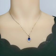 "Full 925 silver Tanzanite necklace decorated with CZ stone Tanzanite jewelry ◆◆Pendant Holder (bezel & Bail) : High Quality 925 Sterling Silver Main Stone:7*9mm Created Tanzanite Whole Pendant Size ( include bail) : 16mm Accent Stone : Cubic Zirconia ◆◆ Necklace chain : Platinum coated 925 sterling silver Box Chain from 16\" to 20\" The model wearing the default size with 18\". Please pay attention to the size Some photos have been enlarged to show details. And others need to minimize for f Elegant Sapphire Drop Necklaces, Elegant Sapphire Pear-shaped Necklace, Elegant Pear-shaped Sapphire Necklace, Formal Tanzanite Teardrop Jewelry, Formal Sapphire Teardrop Pendant Necklace, Formal Sapphire Pear-shaped Necklaces, Formal Pear-shaped Sapphire Necklace, Elegant Teardrop Sapphire Necklaces, Elegant Sapphire Teardrop Necklace