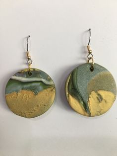 "Lightweight polymer clay circle dangle earrings in gold, silver, black and a hint of green (about 1 1/5\" diameter).  These are very versatile earrings.  They will look great with black, white, naturals and greens. Gold color french hooks. All my current jewelry has been made during this period of odd quarantine and everything seems to have a festive feel.  Everything is colorful, happy, and bold.   Maybe the pieces are even hopeful.  The polymer clay beads have added a whole new dimension to m African Earrings Handmade, Feel Everything, African Earrings, Accessories Boho, Earrings Colorful, Artisan Earrings, Handcrafted Accessories, New Dimension, Colorful Earrings