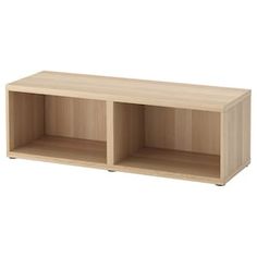 a wooden shelf with three compartments on each side