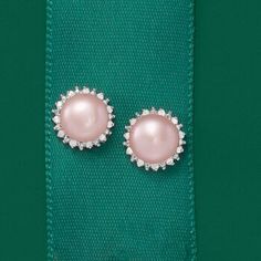 Ross-Simons - 7-7.5mm Pink Cultured Pearl, .13ct t. w. Diamond Earrings in Silver. Sparkle in diamonds and feel pretty in pink! 7-7.5mm cultured freshwater pink button pearls rest in halos of .13 ct. t. w. diamond rounds. The soft pink orbs have an ethereal quality that contrasts beautifully with the striking diamonds. Set in sterling silver. Post/clutch, diamond and pink pearl earrings. Pearl birthstones are the perfect gift for June birthdays. Pink Diamond Earrings With Diamond Accents As Gift, Gift Pink Diamond Earrings With Accents, Elegant Pink Sterling Silver Diamond Earrings, Classic Pink Diamond Earrings For Formal Occasions, Pink Diamond Earrings With Diamond Accents For Wedding, Pink Diamond Earrings With Accents For Wedding, Elegant Pink Diamond Earrings For Anniversary, Pink Diamond Earrings With Prong Setting For Wedding, Elegant Pink Diamond Earrings With Accents