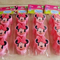 there are many pink mickey mouses in the package