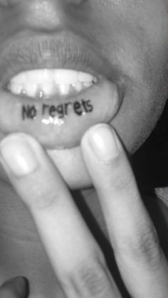 a woman holding her finger up to her mouth with the word no regents written on it