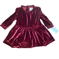 This Velvet Dress And Bloomers Set Is Designed For Special Occasions. Made With High-Quality Materials And Featuring A Lovely Bow Detail, It Ensures Both Style And Comfort For Your Baby. Velvet Dress With Bow Detail Includes Matching Bloomers Designed For Special Occasions Made From Polyester And Elastane Long Sleeves For Added Warmth Button Closure At Back Size: 9m 27-28.5 In / 17-21 Lb Size: 9m Condition: New With Tags Baby Velvet Dress, Dress With Bow, Bow Detail, Velvet Dress, Kids' Dresses, Special Occasion, Long Sleeves, Velvet, Formal Dresses