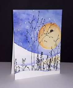 a card with a painting of a snowy landscape