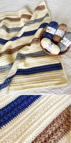 crocheted blanket with yarn and knitting needles on it, next to a basket full of balls of yarn