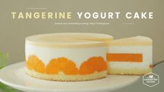 an advertisement for tangerine yogurt cake on a plate with another piece cut out