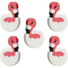 four flamingo magnets are shown with one pink and white bird on it's back