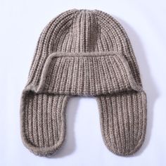 For fashion enthusiasts out there, this beanie is a must-have. Its comfort factor, complete with earflaps, makes it a preferred choice among people. Women particularly love this comfortable beanie for its warmth and coziness. Crafted from high-quality cashmere and wool, it offers both comfort and style. Don't miss out on this trendy beanie!SpecificationsStyle: CasualPlace Of Origin: China (Mainland)Pattern Type: SolidOrigin: Mainland ChinaModel Number: JX-016Material: WoolItem Type: Skullies & BeaniesGender: WOMENFeature: Keep warmDepartment Name: AdultCN: ZhejiangBrand Name: GeraldBlackApplicable Season: WinterApplicable Scene: Casual ShippingThis product ships from China in 3 to 5 days. You should receive this product within 12 to 21 business days. Our standard shipping is free to most c Warm Winter Hat, Cashmere Beanie, Warm Winter Hats, People Women, Winter Walk, Skull Design, Winter Hat, Winter Looks, Beanie Hat