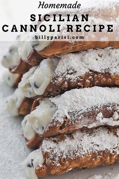 homemade sicilian cannoli recipe with powdered sugar on top