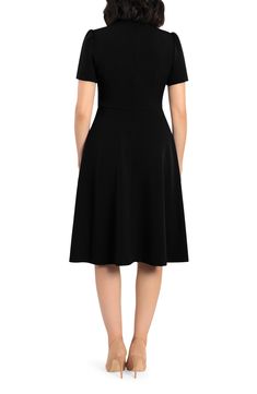 This dainty short sleeve dress is a retro inspired staple that's perfect for any well-dressed occasion. 45" length Necktie Short sleeves Back zip closure Lined 96% polyester, 4% spandex Hand wash, dry flat Imported Model Stats: 5'10" height; 34" bust; 27" waist; 35" hips. Classic Short Sleeve Midi Dress, Classic Short Sleeve Office Dresses, Black Short Sleeve Midi Dress For Semi-formal, Black Short Sleeve Midi Dress For Semi-formal Occasions, Fitted Short Sleeve Knee-length Solid Dress, Fitted Solid Color Short Sleeve Knee-length Dress, Black Short Sleeve Dress For Formal Occasions, Formal Black Dress With Short Sleeves, Black A-line Short Sleeve Dress For Work