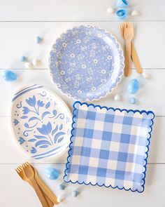 blue and white dishes with wooden utensils