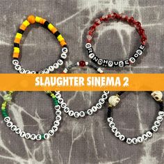 three bracelets with the words slaughterer sinema written in white and black letters