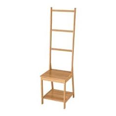 a wooden chair with two shelves on the bottom and one shelf below it, against a white background