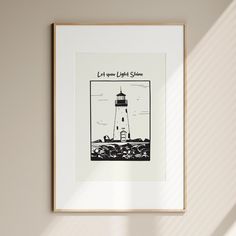 a black and white drawing of a light house with the words let your light shine above it