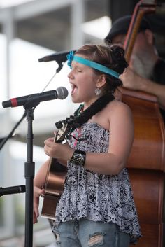 JUNE 16, 2015 2015 CMA Music Festival BMI singer/songwriter Emi Sunshine performs on the BMI tailgate stage at CMA Fest. Originally from East Tennessee, Sunshine is only 11 years old and has upcoming performances at the Grand Ole Opry. Festival List, Winter Music, Grand Ole Opry, East Tennessee, June 16, Music Concert, Music Festivals