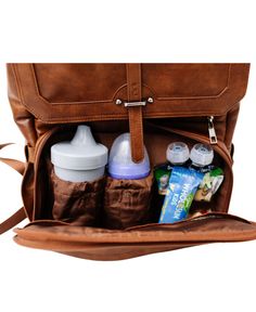 a diaper bag filled with baby bottles