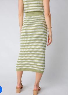 Step up your spring style game with this fabulously elevated knit skirt - a must-have for any chic fashionista. Color: Natural & Light Green Bodycon midi skirt High-waisted fit Knit material Matching top sold separately Full length for a size medium: 29.5 inches 70% Polyester, 30% Viscose Hand wash cold Hang to dry Knitted Long Skirt, Chic Fashionista, Bodycon Midi Skirt, Knit Maxi Skirt, Ooh La La, Crisp White Shirt, Easy Breezy, Matching Top, Cozy Knits