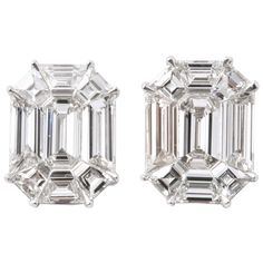 These earrings give the illusion of 7-8 carat EACH emerald cut studs! 4.65 carats of F VS special cut diamonds, masterly set to look like one emerald cut diamond. Set in 18k white gold The earrings measure 12.8 mm x 10 mm approximately. A wearable pair of earrings, full of sparkle! Emerald Earrings Studs, Emerald Cut Diamond, Drop Dead, White Gold Jewelry, White Gold Earrings, Pompeii, Emerald Cut Diamonds, Fine Jewellery Earrings, Gold Jewelry Fashion