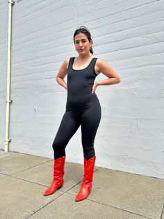 We're pretty sure the scoop neck unitard will be your newest super stretchy BFF! Made from our 100% recycled tricot, this pull on, all-in-one look makes getting dressed a breeze. The unitard has full length legs, a scoop neck and back, and all the stretch you need for a perfect form fitting jumpsuit that can take you from yoga to a night out on the town.🤸‍♀️ Fitted Unitard For Summer, Fitted Solid Color Unitard For Summer, High Stretch Full Length Elastane Unitard, High Stretch Footless Unitard, Summer Stretch Unitard In Solid Color, Summer Stretch Solid Unitard, Summer Stretch Solid Color Unitard, Black High Stretch Unitard For Fall, High Stretch Full Length Unitard For Fall