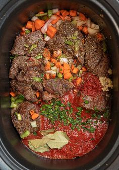 the meat and vegetables are mixed together in the slow cooker to make an entree