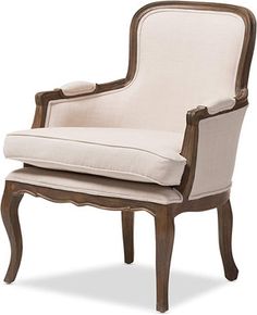 an upholstered chair with white linen and wood trim