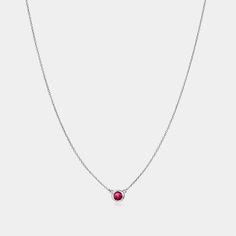 Ignite your inner fire with our Ruby Solitaire Birthstone Necklace. Ruby is a cardinal gemstone, which traditionally signifies the rarest and most precious of stones. Symbolizing passion, protection, and prosperity. The perfect gift for anyone born in July. Gemstone: Natural Ruby Month: July Pendant dimensions: .21" x .21" (5.3mm x 5.3mm) Chain length: 16" (40.5cm), extends to 18" (45.5 cm) Please note, natural gemstones may vary in color. July Gemstone, Necklace Ruby, July Born, July Birthstone, Recycled Gold, Natural Ruby, Birthstone Necklace, Traditional Techniques, Chain Lengths