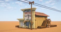 a small building in the middle of a desert with power lines above it and a sky background