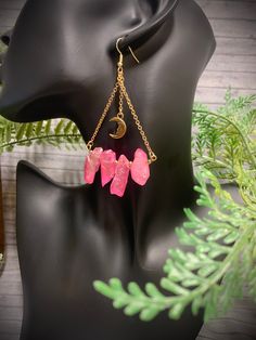 dangle earrings with pink quartz and metal gold moons Pink Dangling Charms Drop Earrings, Pink Drop Earrings With Dangling Charms, Pink Metal Dangle Chandelier Earrings, Pink Crystal Dangle Earrings With Ear Wire, Pink Dangle Chandelier Earrings For Pierced Ears, Pink Metal Chandelier Dangle Earrings, Pink Metal Dangle Crystal Earrings, Pink Pierced Dangle Chandelier Earrings, Pink Metal Drop Earrings